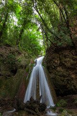 Waterfall in the woods in Pale (Umbria, Italy)