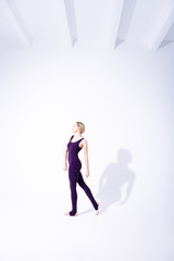 Beautiful slim woman having a professional training