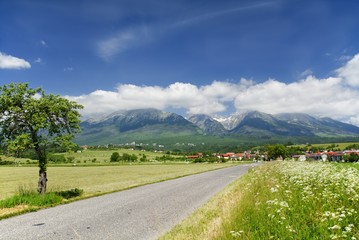 Fototapeta na wymiar View of the Tatras Mountains and the villages of Nova Lesna and Stary Smokovec. Slovakia. Europe. 