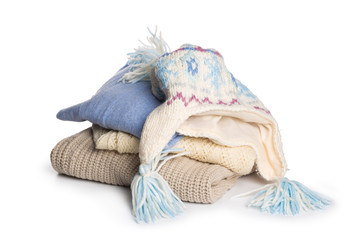 Folded sweater pattern on white background isolation.