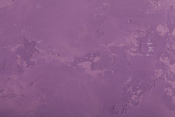 Beautiful, abstract, bright, colored surface of the plaster wall as a background and texture. Possible to use as a stylized surface with space for text