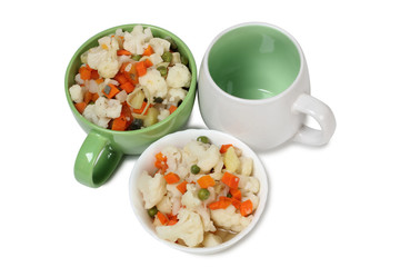 Fototapeta na wymiar Porcelain plate with vegetable soup on white background