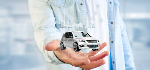 Businessman holding Dashboard smartcar interface with multimedia icon and city map on a background 3d rendering