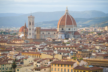 The dome of the Cathedral of Santa Maria del Fiore in the cityscape on a September afternoon. Florence, Italy