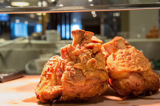  crispy prok knuckle in dish restaurant