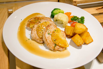  delicious pork steak on white plate