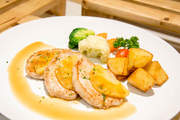  delicious pork steak on white plate