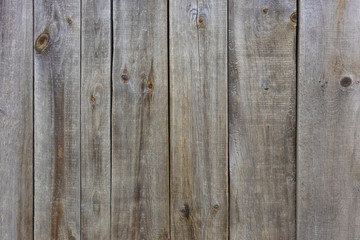 Texture of old wooden gray vertical boards, vintage background