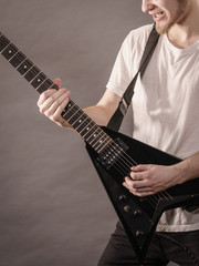 Man playing on electric guitar