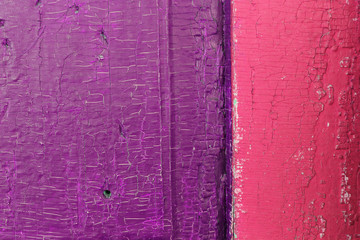 Old wooden background with remains of pieces of scraps of old paint on wood. Texture of an old tree, vintage wood background peeling paint. old blue board with cracked paint