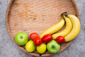 Tropical fruits in a threshing basket