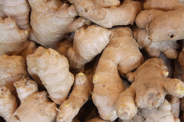 Full frame image of root ginger on display in a market