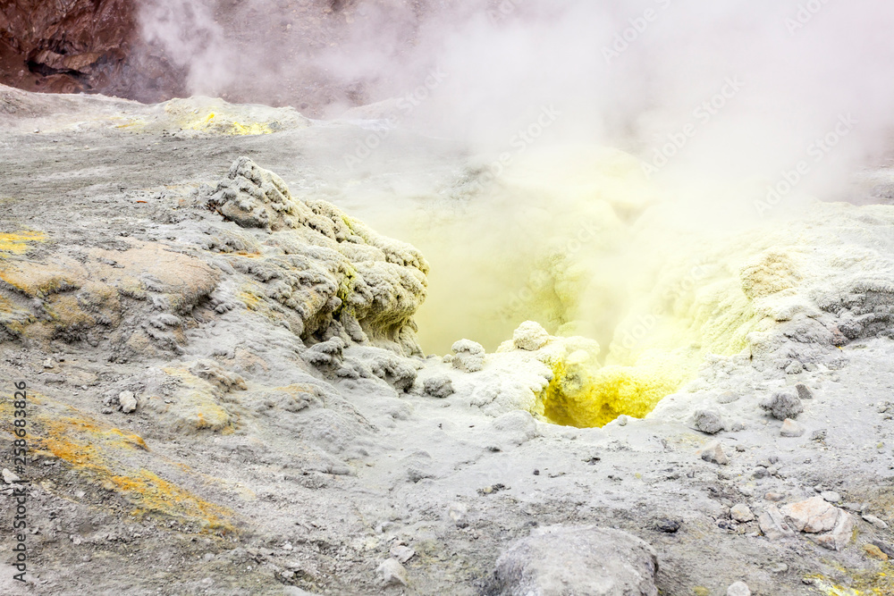 Wall mural steaming, sulfuric, active fumaroles near volcano mutnovsky, kamchatka peninsula, russia