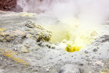 Steaming, sulfuric, active fumaroles near Volcano Mutnovsky, Kamchatka Peninsula, Russia
