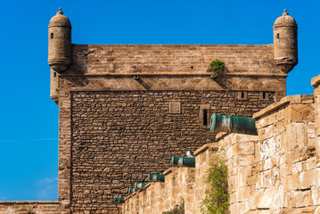 View on Fort with old Historical portugese Metal Cannons In a Fortress. Walls with cannons and...