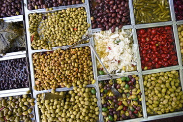 Close-up of pickles and coloured olives. Levinsky market, Tel Aviv