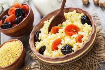 Millet porridge with dried fruits