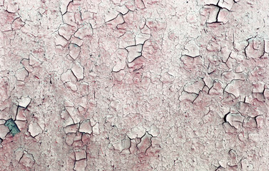Old wooden background with remains of pieces of scraps of old paint on wood. Texture of an old tree, board with paint, vintage background peeling paint. old blue board with cracked paint,