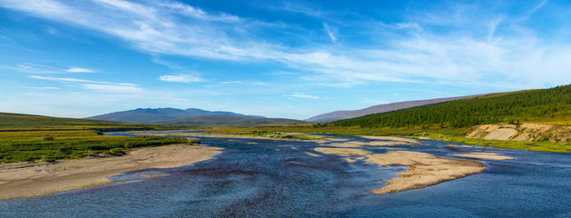Summer day landscape with mountains and lake in the tundra, Yamal, Russia