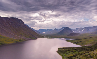 Summer sunset  landscape with mountains, Lake Hadata, Polar Urals, Yamal. Top view
