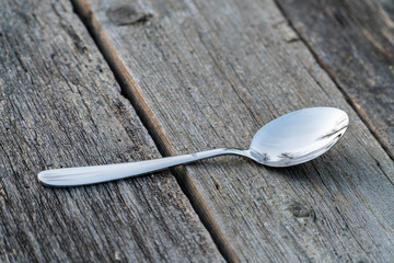 knife and fork on wooden background. Cutlery on wooden.