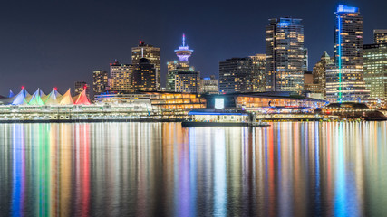 Vancouver, British Columbia, Canada. Long exposure at night over BC Place with downtown in the...