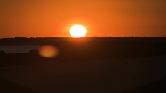 Sunrise timelapse over coastal beaches and rocks