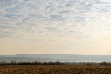 Rural scenery in Moldavia, along the national road E85. View towards Siret river