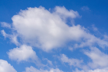White clouds in the blue sky in spring