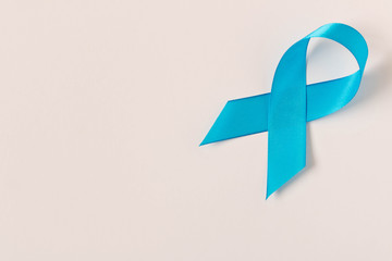 Blue ribbon.  Isolated on white background with empty space for text. Close up.