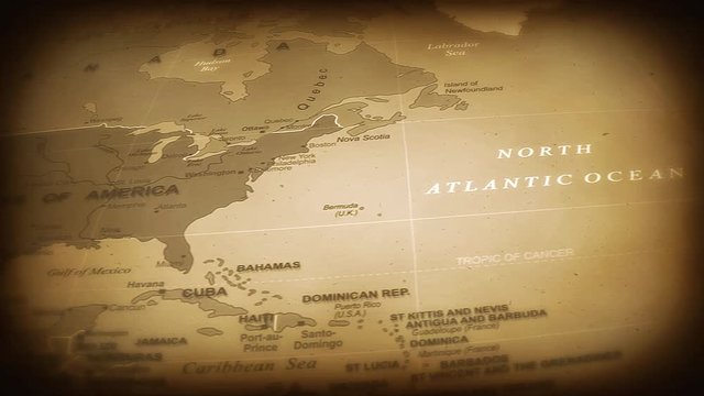 Vintage World Map Flight Over Background/ 4k animation of a vintage historical world map travel background flight over with ocean, countries and cities names