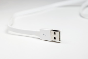 white long cable usb on white background in studio close up