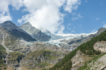 Naklejka na ściany i meble summer landscape with permanent glaciers Swizerland Alps