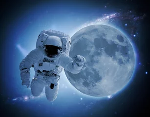 Zelfklevend Fotobehang astronaut levitate in space in front of moon. elements of this images furnished by nasa © Mihail