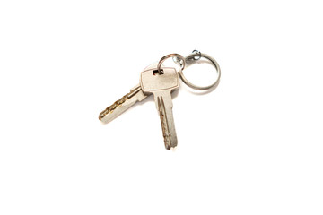 metal apartment key isolated on white background