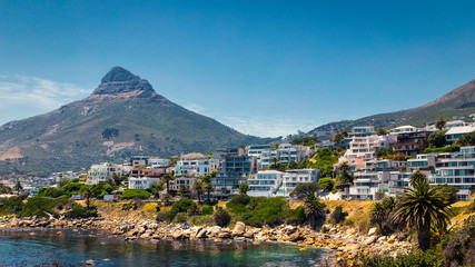 Lion's head mountain and apartment buildings on the coast of Cape Town