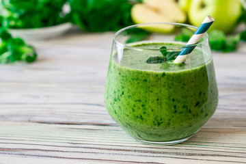 Detox fresh green smoothie with spinach, apple, mache lamb lettuce