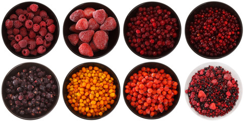 Set of frozen berries in a cup. Isolated on white background. View from above.