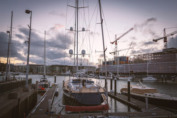 Sailboat in Auckland harbour at sunset, New Zealand