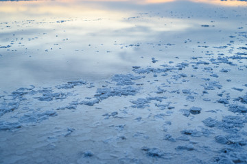 Salt lake. Elton. Footprints in the sand.