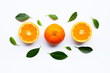 Fresh orange citrus fruits with leaves on white background.