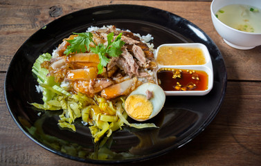 crispy pork belly on topped rice - Asian food style