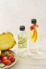 Variety of infused detox water isolated on white, health concept