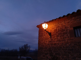 Rural lamppost lit at dusk © OTTSTUFF