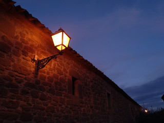 Rural lamppost lit at dusk © OTTSTUFF