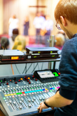 Church sound mixing station during ceremony