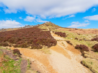 Narrow, steep footpath up to yhe top of Higger Tor in the Derbyshire Peak District.