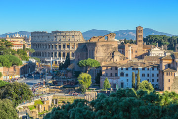 Naklejka premium Scenic shot of Rome with Colosseum and Roman Forum, Italy.