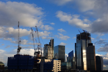 Photo from iconic modern skyscrapers in business district of Bank in the heart of London on a cloudy sky, Great Britain