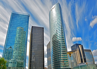 District La Defense in Paris. It is Europes largest business district with glass and steel buildings and skyscrapers